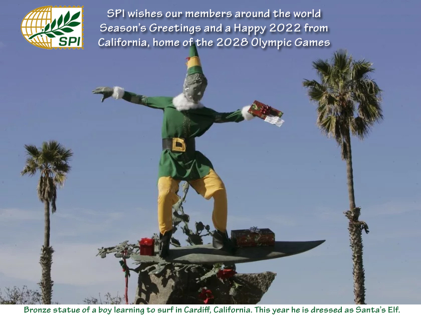 Postcard showing surfer in elf costume